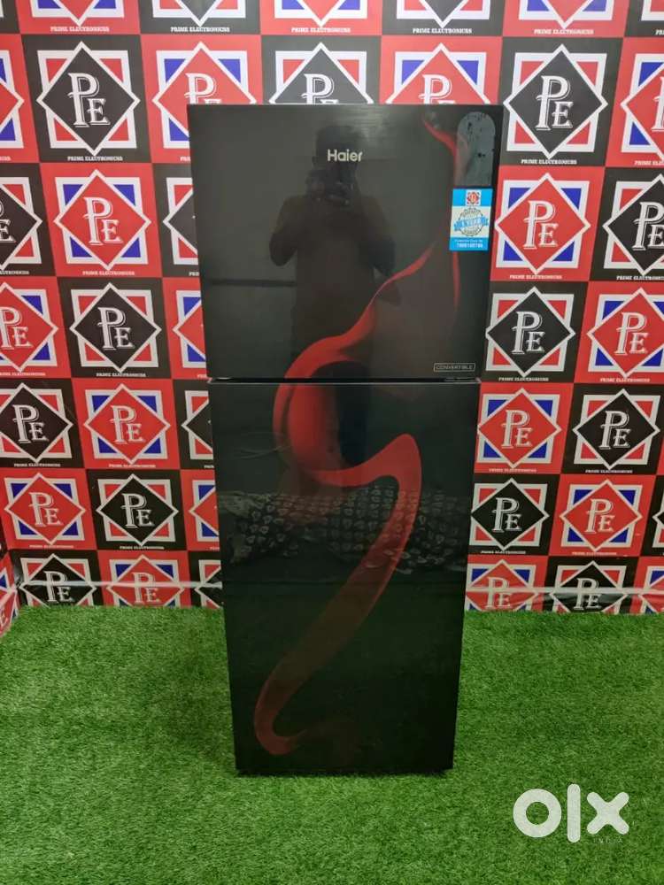 :- Haier brand new glass fridge just used for 6 months with door delv