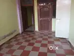 1BHK room  with bed and fan in budget