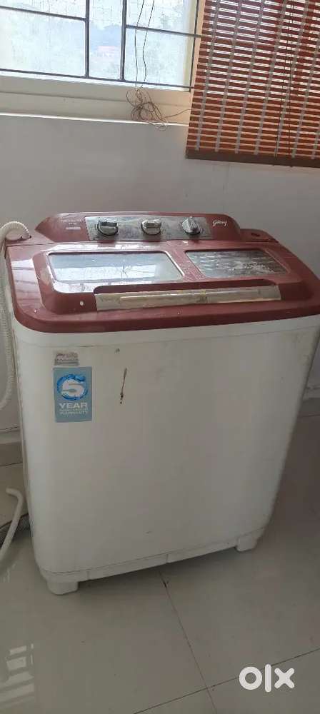 Washing machine and fridge in good working condition