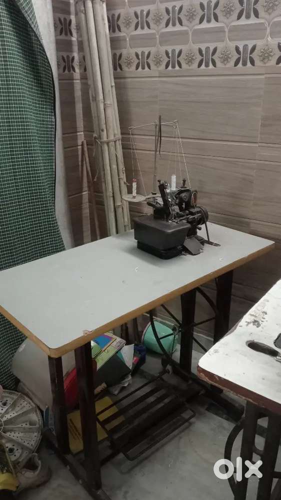 Sewing machine and interlock machine