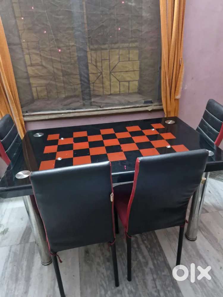 Six seater glass top Dining table with 4 chairs