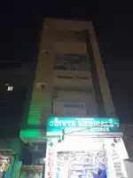This ad is for sale of building, not flat sale