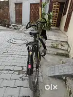 Good condition bicycle, green, grey and black colour, new tyre tubes.