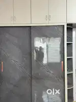 New house with wardrobes in all bed rooms. Modular kitchen. TV unit