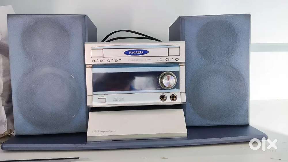 Music system with speakers and radio