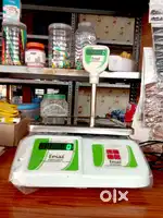 Less usages 30kg Weighing machine and SPS 10 Sealing machine