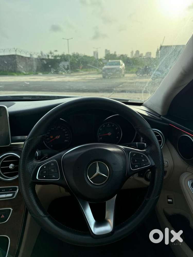 Pearl white Mercedes Benz with prime number and well maintained