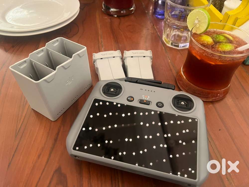 DJI RC -2 with 2 aircraft batteries and charging dock