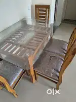 Glass top 4 seater dining table in perfect condition