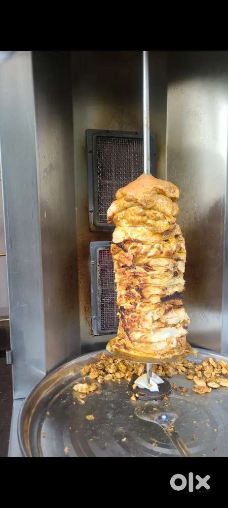 A Shawarma Chef is responsible for preparing and cooking shawarma