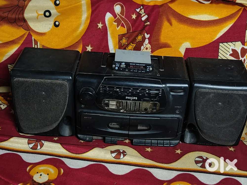 Radio , cassette player with detachable speakers