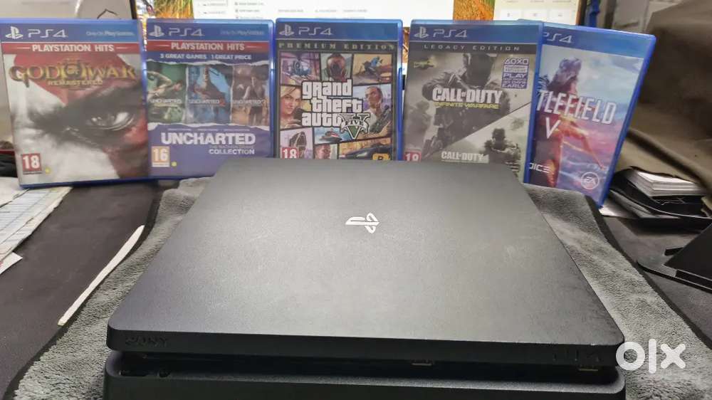 Sony PS4 slim 1tb 5 cd Free seal intact