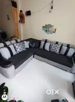 Stylish L-Shaped 6-Seater Sofa with 8 Cushions – Good Condition