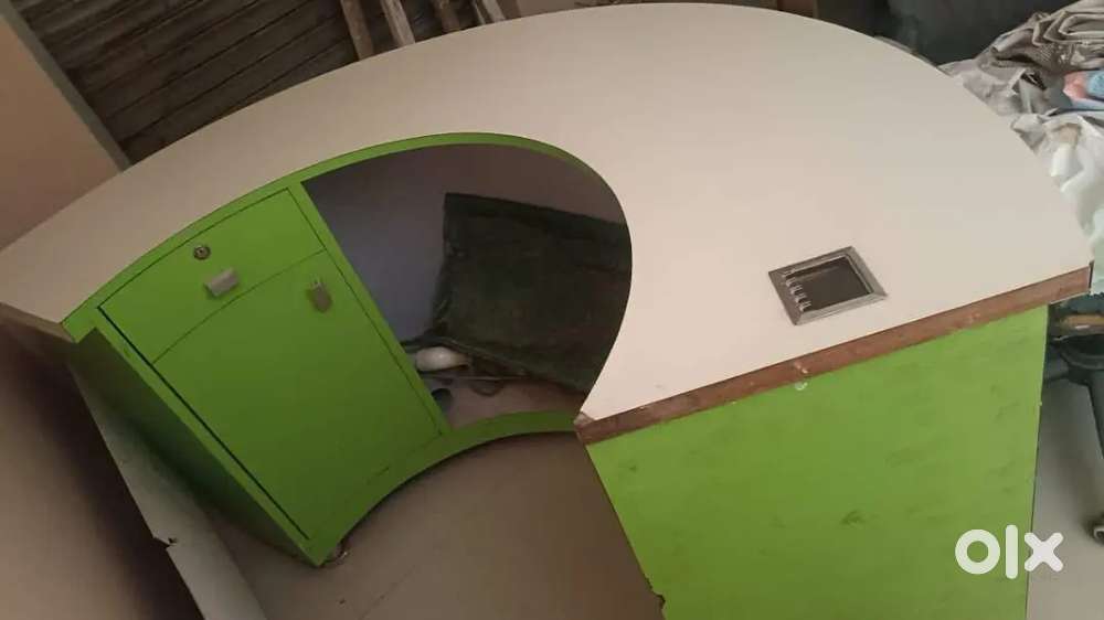 A semi circular table can be used for desktop or as a counter