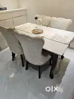 Dining table in new condition 2 months old