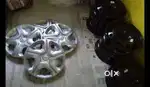Tata Nexons original  5 black steel rims and 4 silver wheel cover