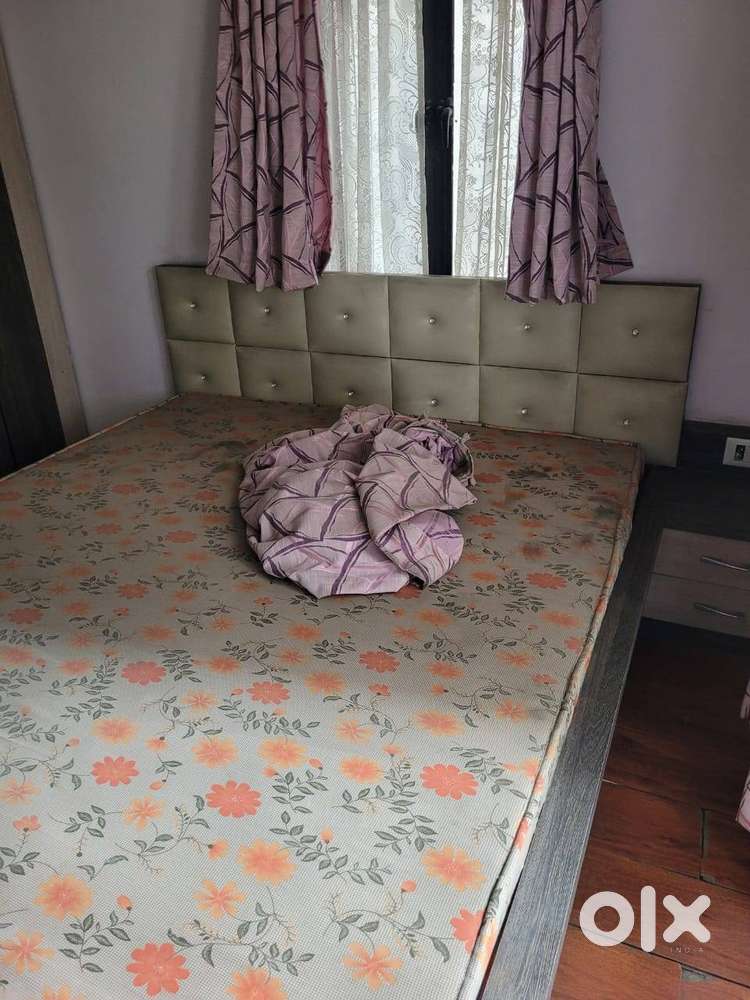 Box Bed with side table and kurla on mattress