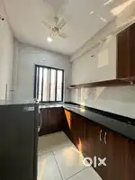 40lac-2bhk main road flat with big balcony read full ad.