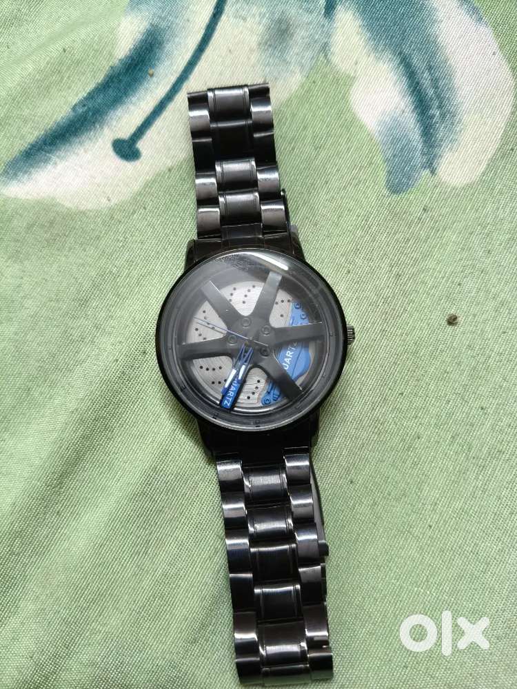 Men's spinning car watch