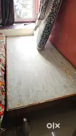 Single wooden cot/bed