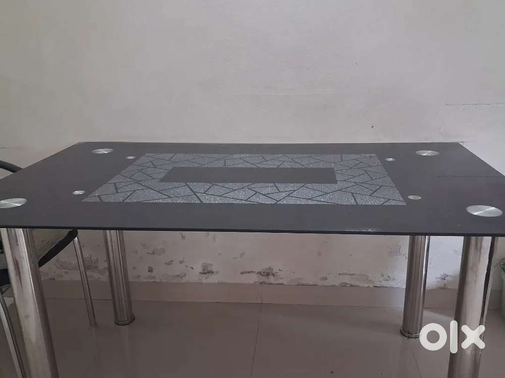 Glass top dining table 6 seater