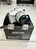5 months old white Canon EOS R50 Mirrorless Camera for sale.