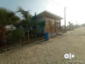 100 Yards plot in a gated township on national highway
