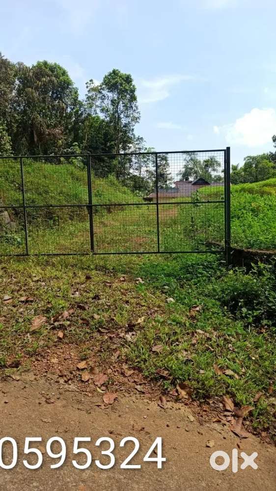 26 cents,( ready to sell as 2 Plots also) Near Pampady Town.