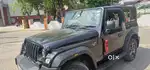 Black Mahindra Thar 4×4 AT Petrol Top Variant in a very Good Condition