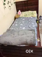 Wooden bed single