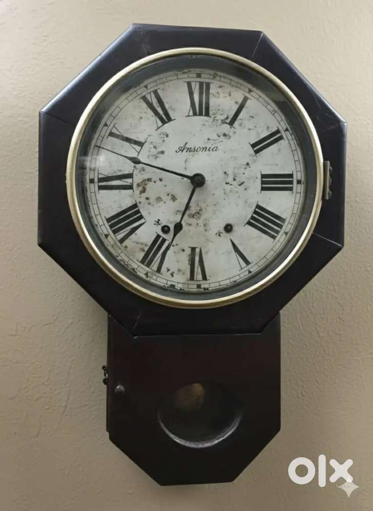 Winding wall clock antique vintage
