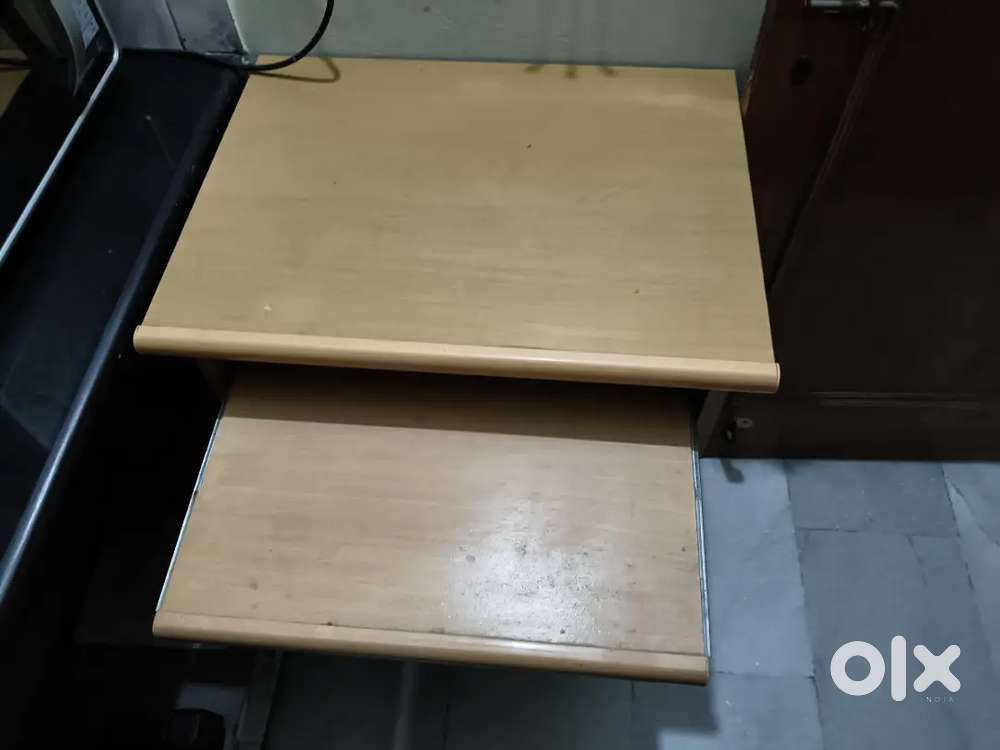 Study table with sliding wheels