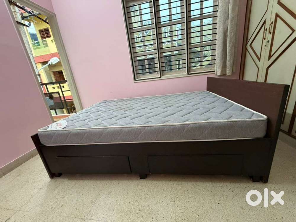 Teak double cot with memory foam mattress available for sale