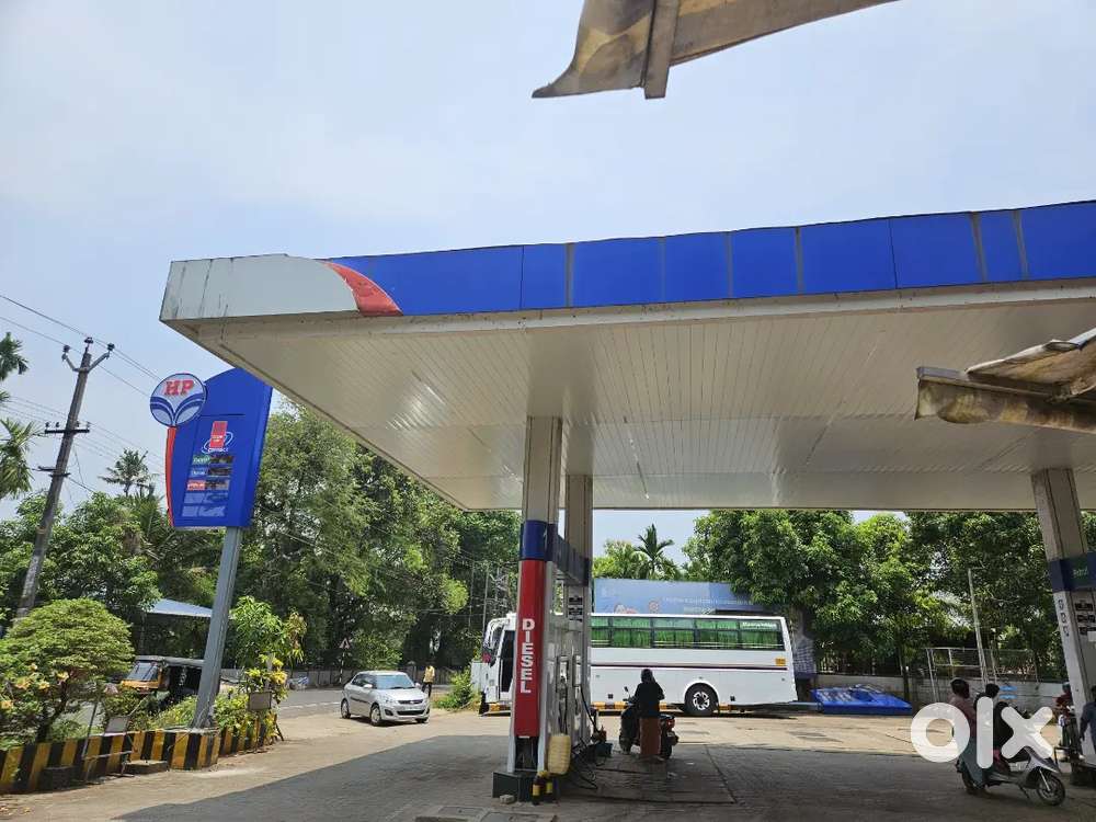Petrol pump with 50 cent land at Punaloor town 20 load sale 13cr  neg.