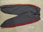 Track pants with red stripe