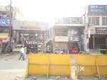 Two wheeler parking stand and one shop space for rent in LMW bus stop