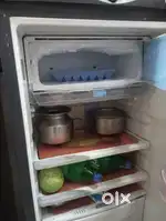This Godrej fridge is in poor condition.