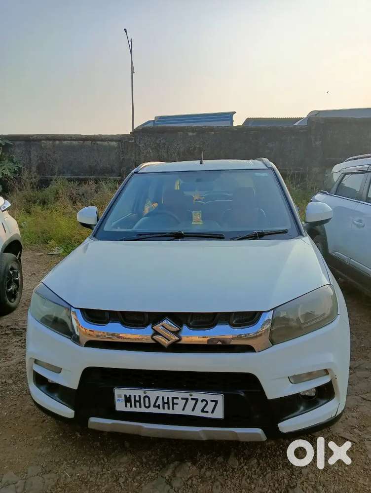 Breeza ZDI In white colour is in very very good condition