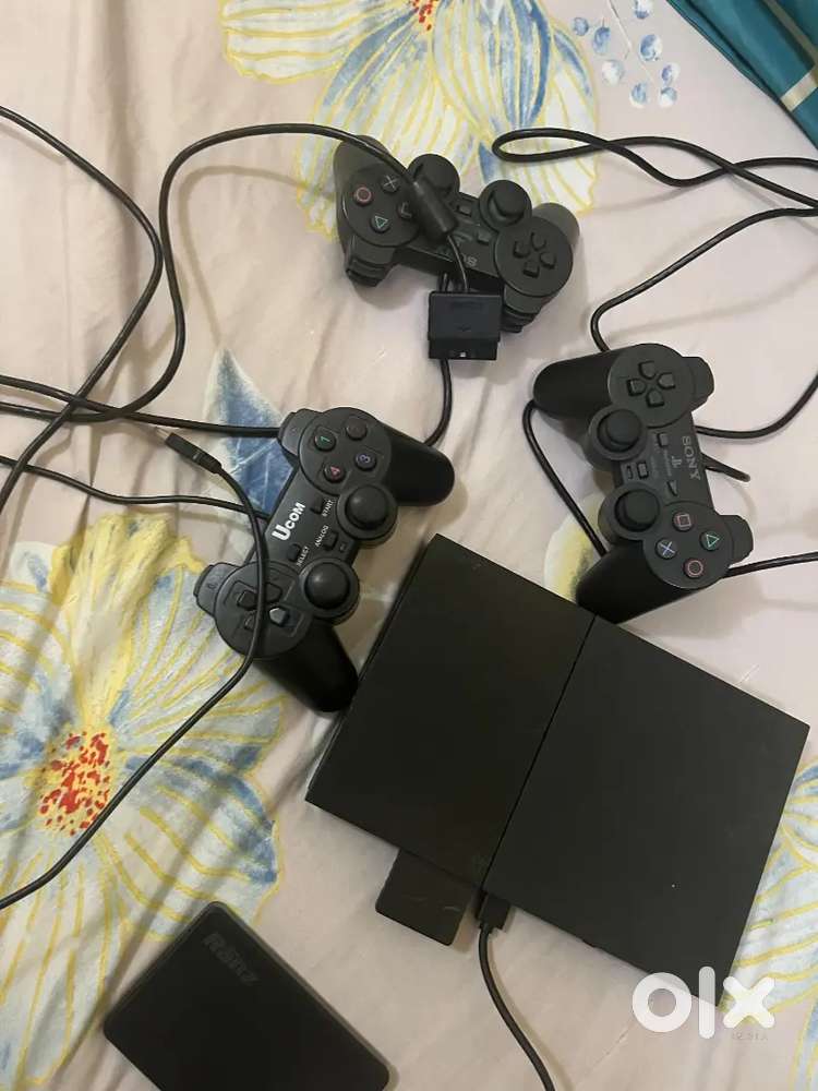 Ps 2 for gaming with memory card and hard disk containing 100 games