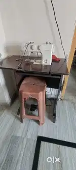 Stitching machine table