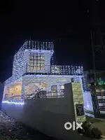 A brand new home with a beautiful lawn and a mini swimming pool aswell