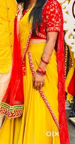 Lengha with drape dupatta and blouse. Colour- yellow and red