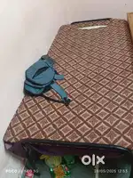 Wooden folding bed