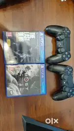 Sony ps4 for sale with extra controller and multiple game discs