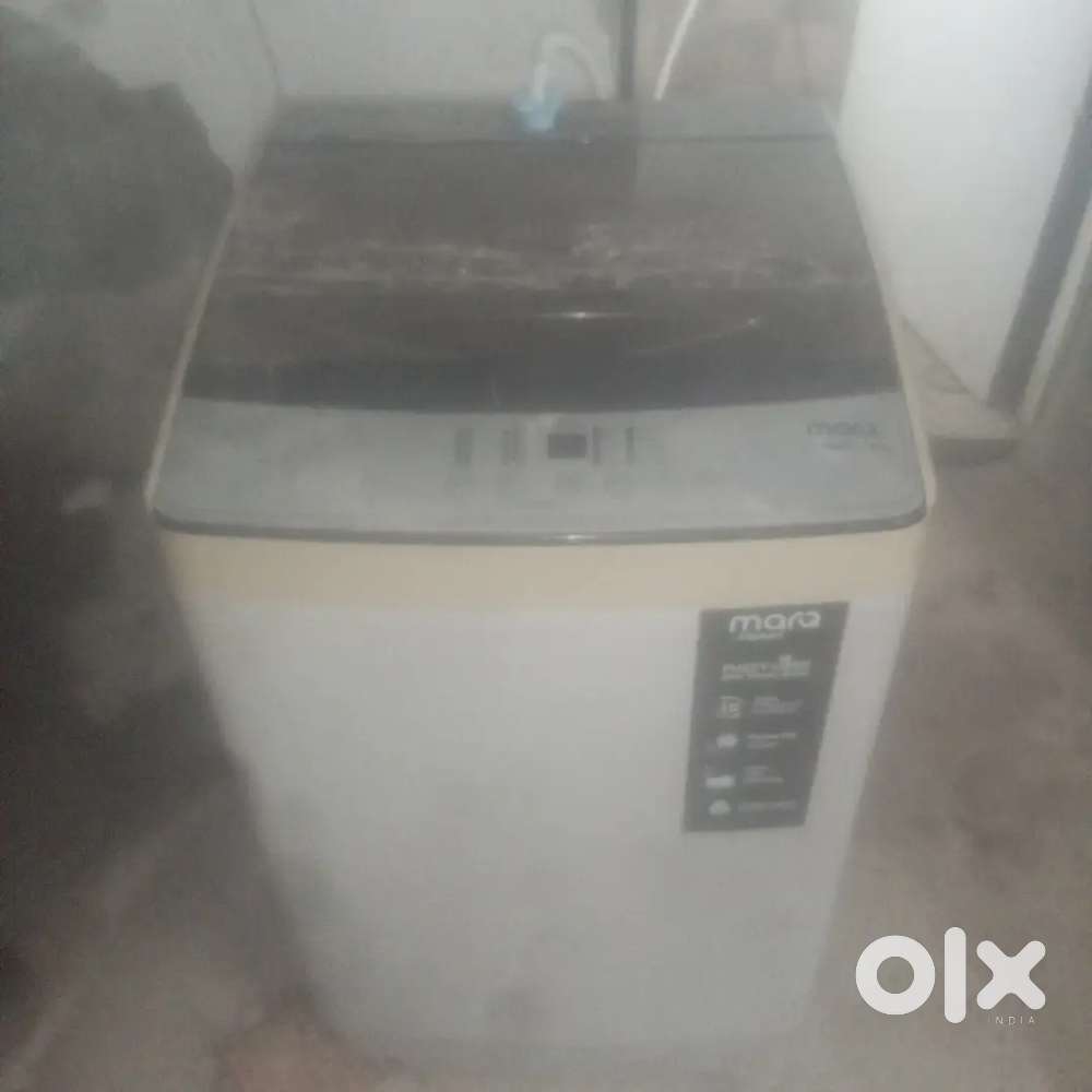 Marq fully automatic 7 kg top load working condition washing machine