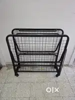 Rollaway folding single bed in good condition