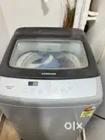 A fully automatic washing machine top load samsung with capacity 6.5