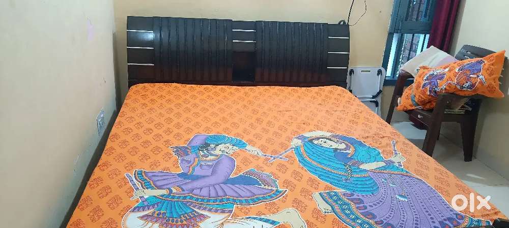 Double bed with matters and computer table