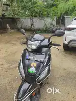 Maestro Black Near Scooter