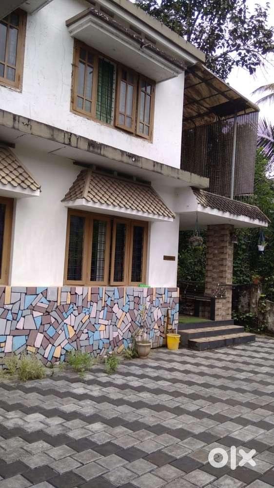 13.5 cent , NH frontage plot with house for sale.